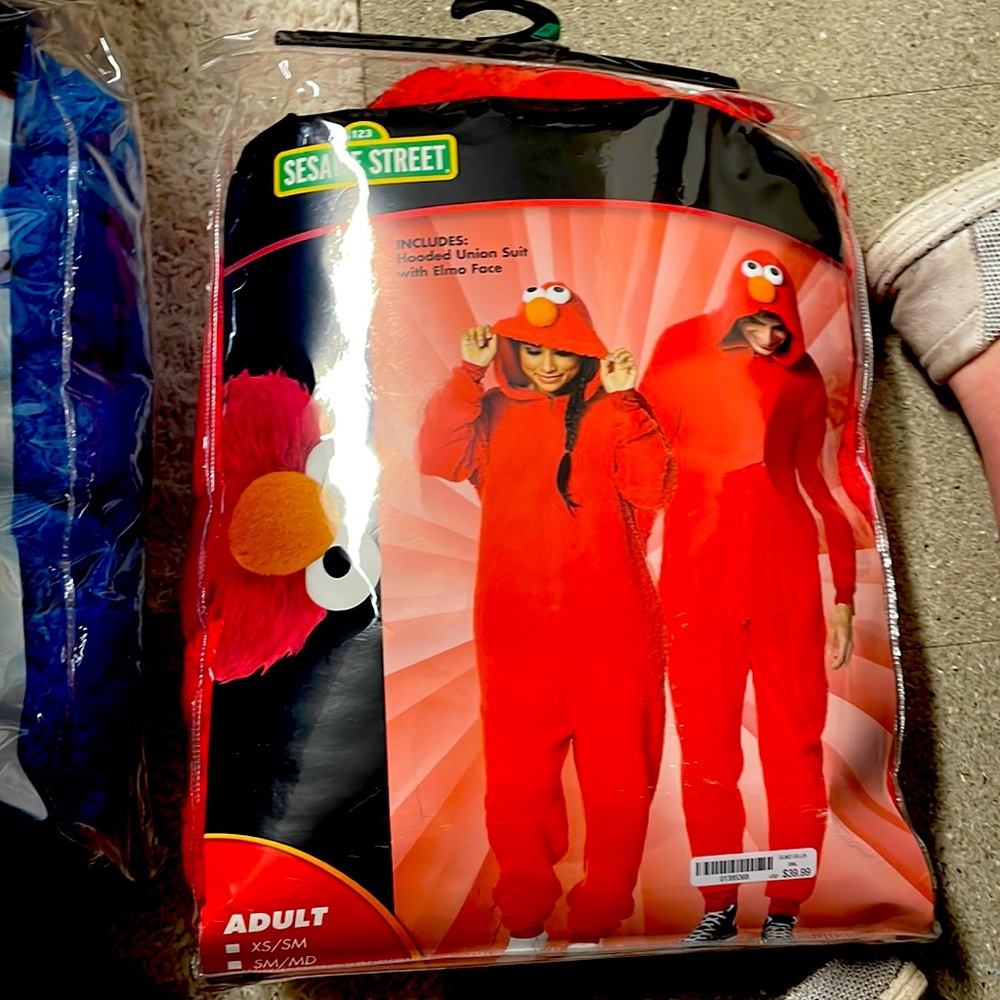 2 Sesame Street Onesies, Only worn once for Halloween. Selling both of them as 1